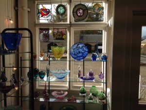 hand made glass window display by Julia Linstead